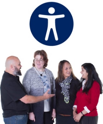A group of people having a conversation. Above them is an accessibility icon.