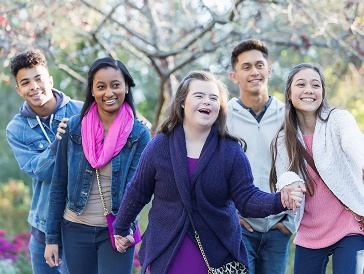 A group of people doing an activity together in a public space.