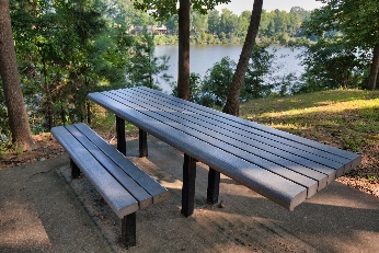 A bench with a space for people with mobility aids.
